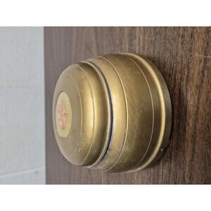 Vintage Gold-Colored Musical Powder Box with Floral Design